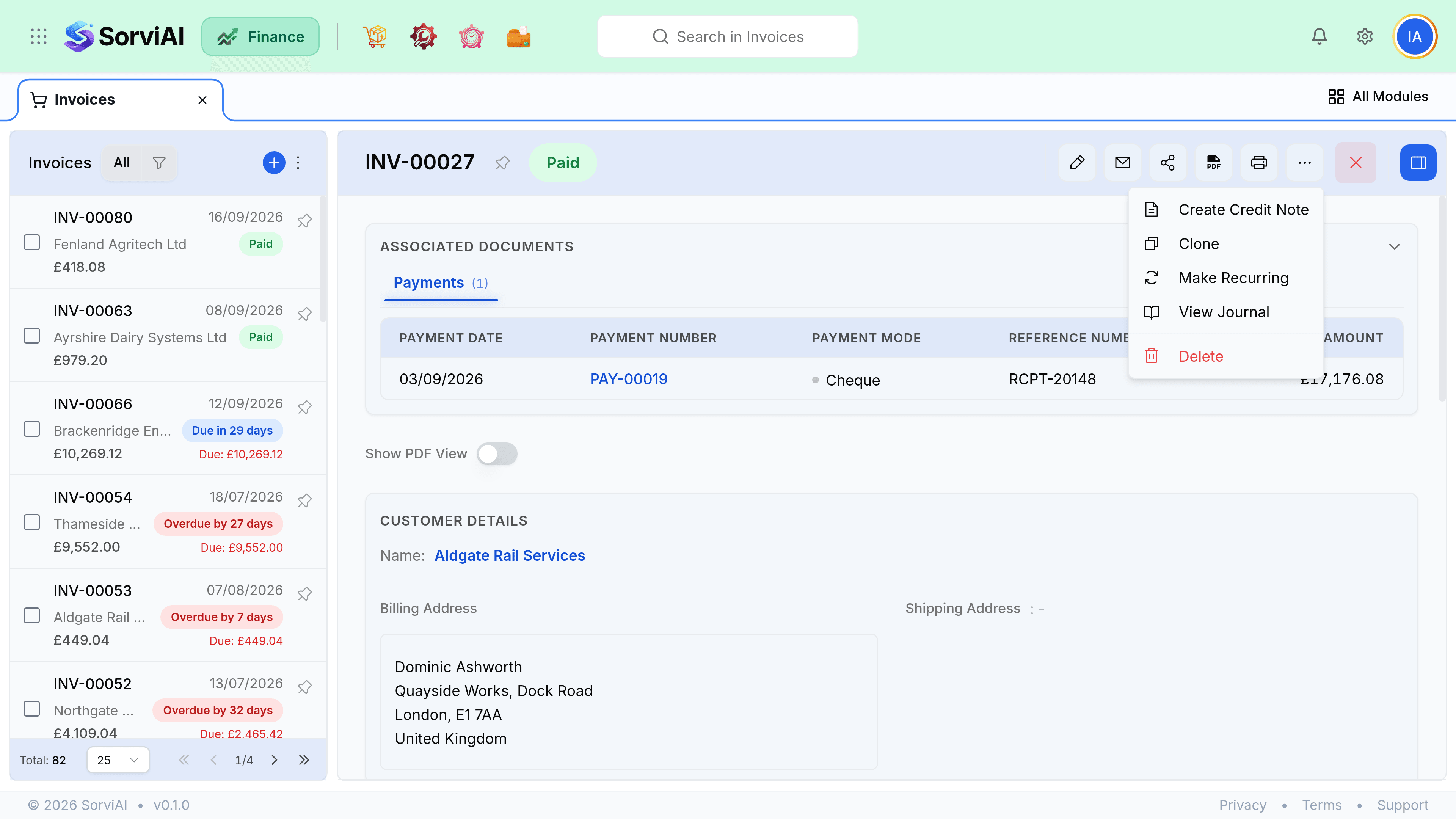 The more-actions menu open on an invoice, listing Create Credit Note, Clone, Make Recurring, View Journal and Delete. The invoice behind it shows a Paid badge and its recorded payment.