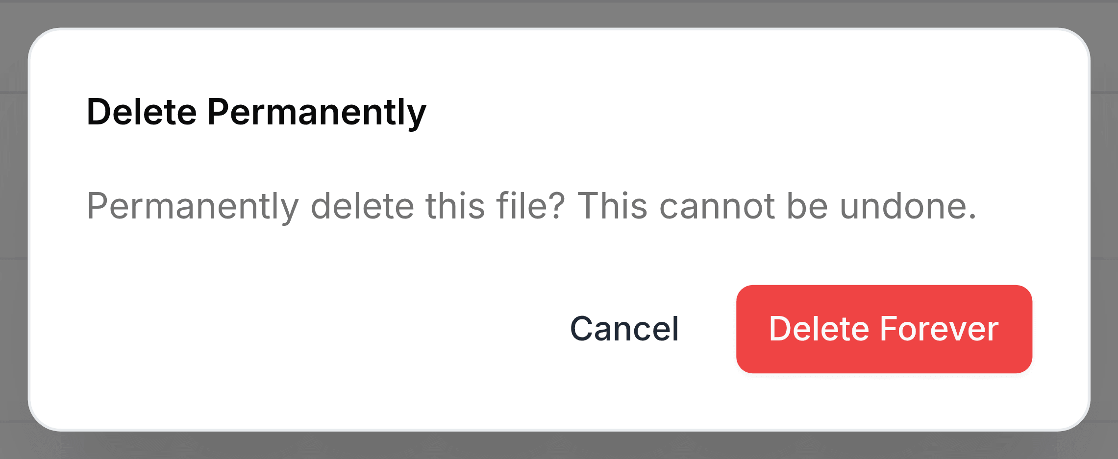 A confirmation panel headed Delete Permanently, reading Permanently delete this file? This cannot be undone, with Cancel and a red Delete Forever button.