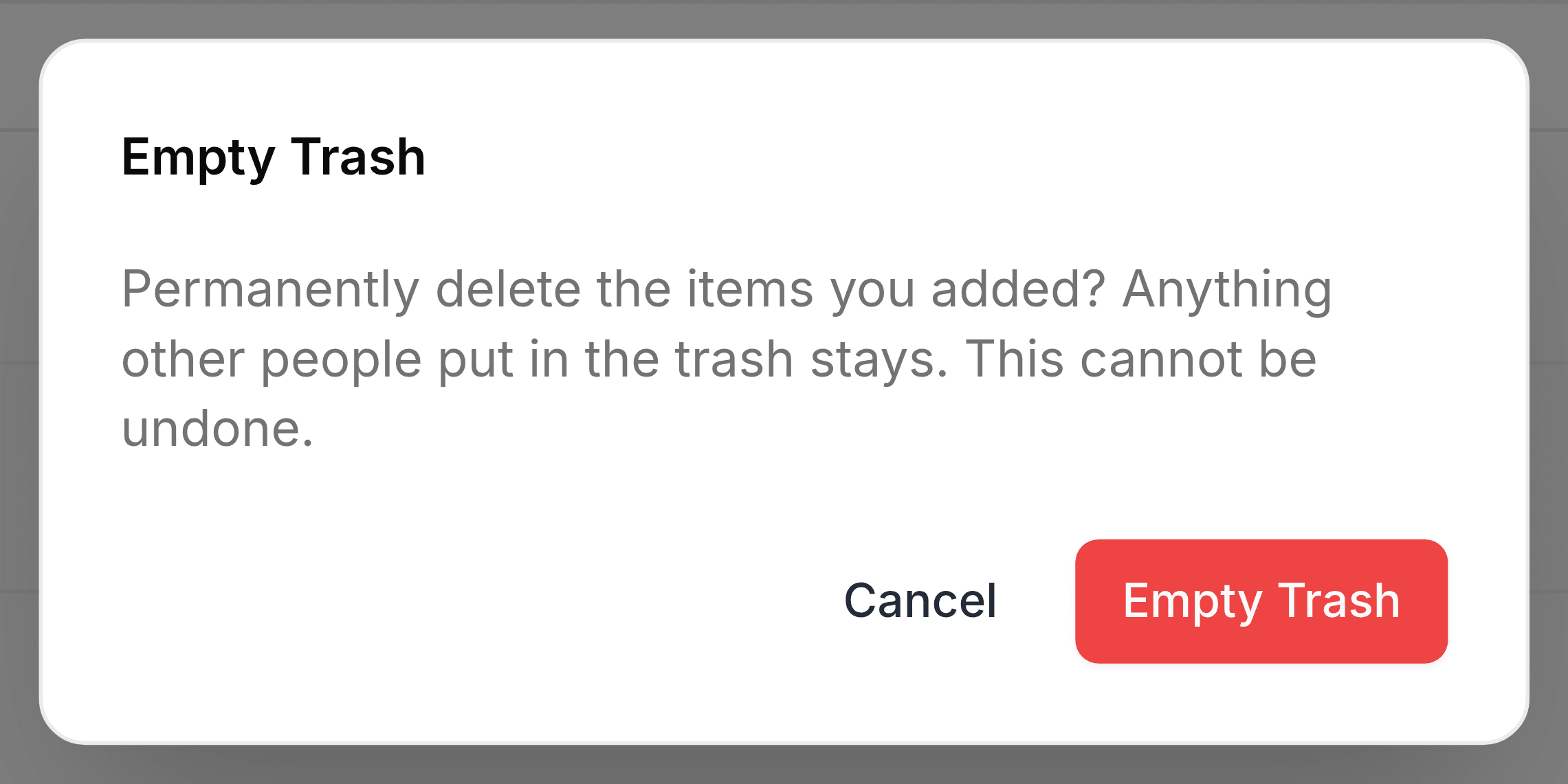 A confirmation panel headed Empty Trash, reading Permanently delete the items you added? Anything other people put in the trash stays. This cannot be undone, with Cancel and a red Empty Trash button.