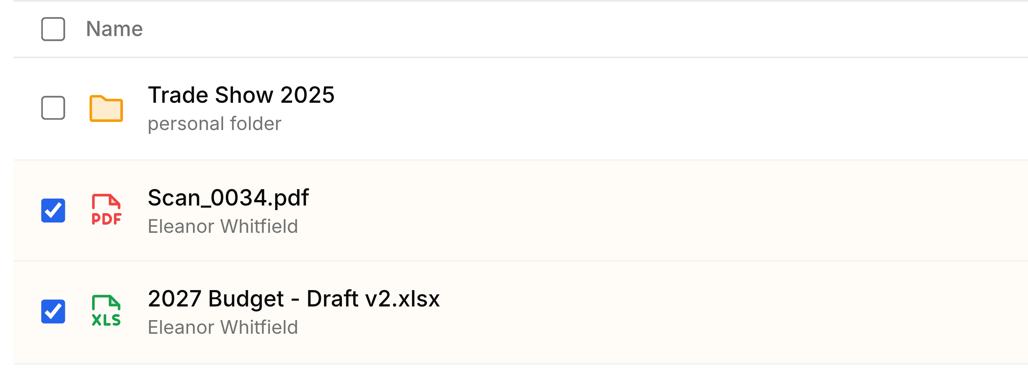 The Trash list with a select-all checkbox in its header. Scan_0034.pdf and 2027 Budget - Draft v2.xlsx are ticked; the Trade Show 2025 folder above them is not.