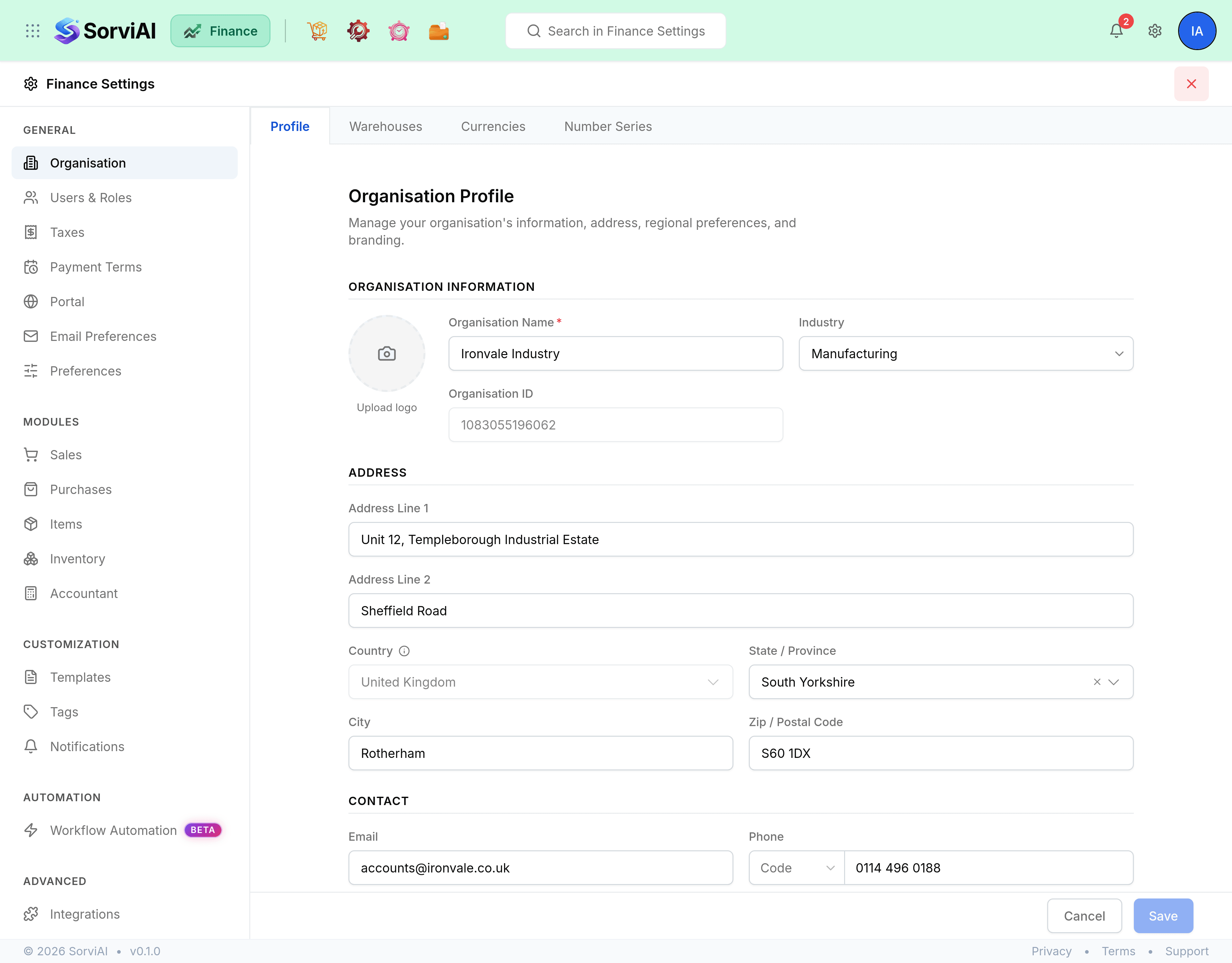 Finance Settings, headed with a cog and a red cross at the top right. A column on the left lists the settings screens under five headings: GENERAL holds Organisation, Users & Roles, Taxes, Payment Terms, Portal, Email Preferences and Preferences; MODULES holds Sales, Purchases, Items, Inventory and Accountant; CUSTOMIZATION holds Templates, Tags and Notifications; AUTOMATION holds Workflow Automation with a Beta pill; ADVANCED holds Integrations. Organisation is selected, and its pane carries tabs reading Profile, Warehouses, Currencies and Number Series. The Profile tab is open on Organisation Profile, with an Upload logo circle, Organisation Name reading Ironvale Industry, Industry set to Manufacturing, a read-only Organisation ID, an Address of Unit 12 Templeborough Industrial Estate, Sheffield Road, Rotherham, South Yorkshire, S60 1DX, United Kingdom, and Contact details below. A Cancel and Save bar sits at the foot.