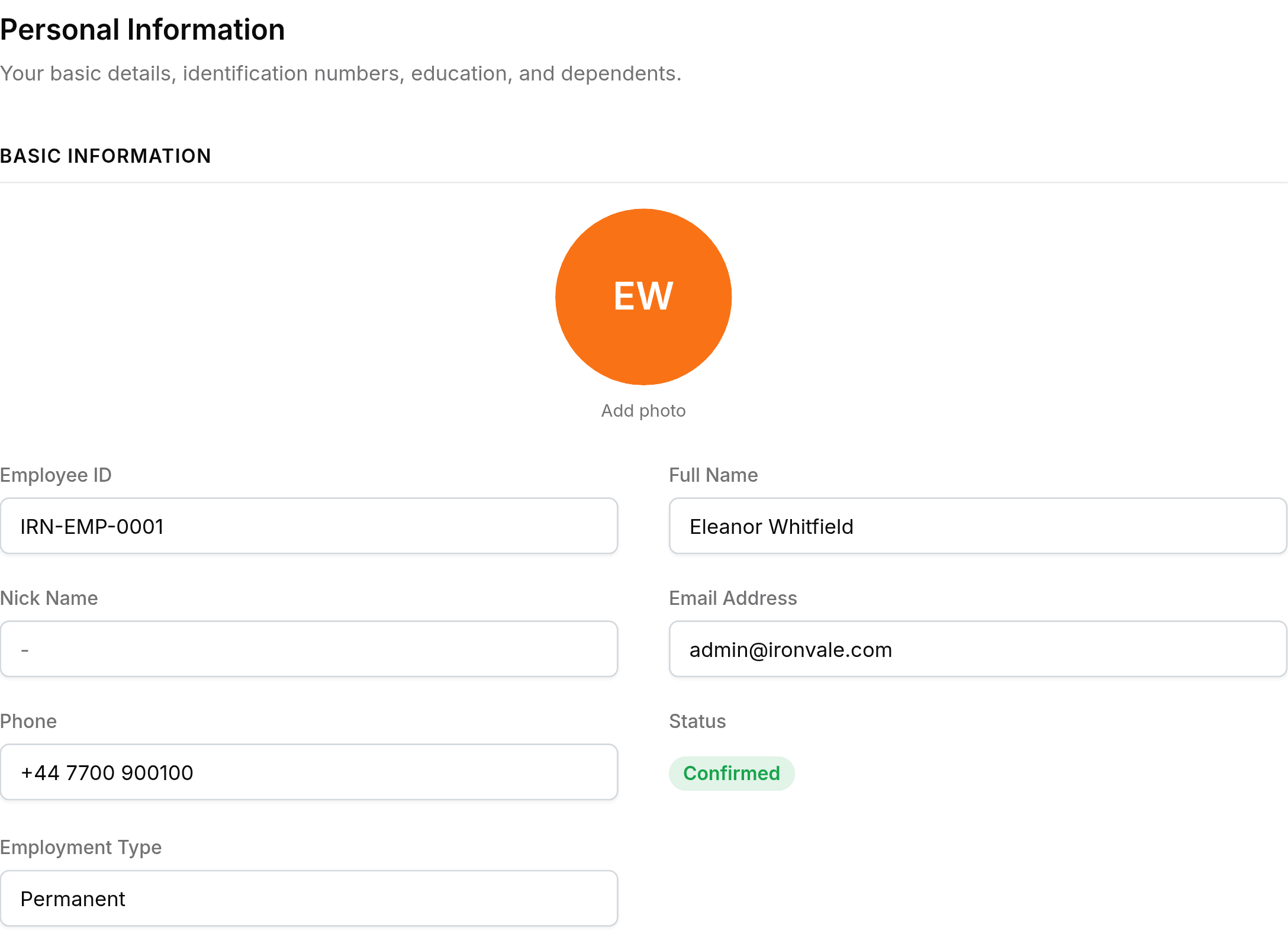 The Personal Information tab, headed Personal Information above the line Your basic details, identification numbers, education, and dependents. A Basic Information section shows a large orange EW avatar with Add photo underneath, then Employee ID IRN-EMP-0001, Full Name Eleanor Whitfield, Nick Name, Email Address admin@ironvale.com, Phone +44 7700 900100, a green Confirmed status and Employment Type Permanent. A Personal Details heading follows with an Edit pencil at its right.