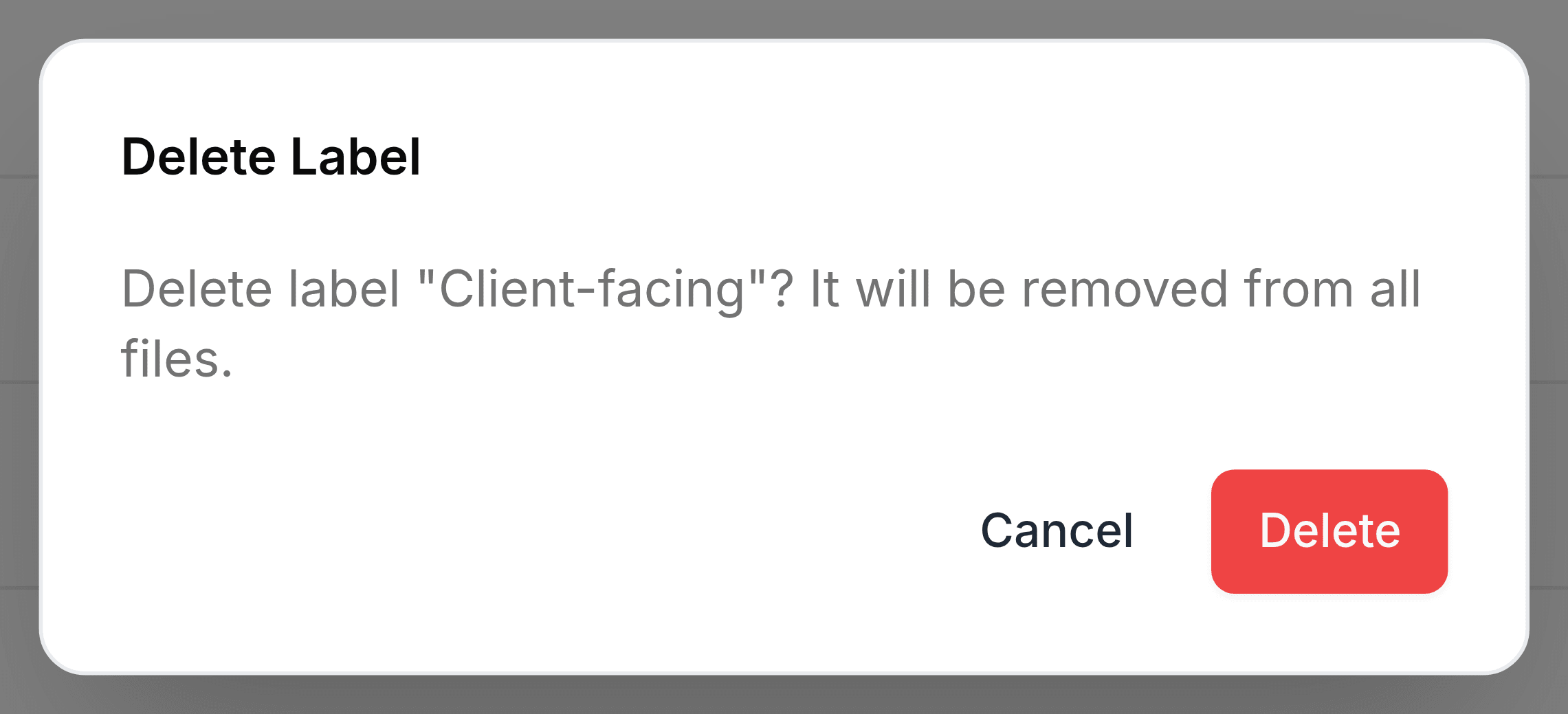 A confirmation panel headed Delete Label, reading Delete label Client-facing? It will be removed from all files, with Cancel and a red Delete button.
